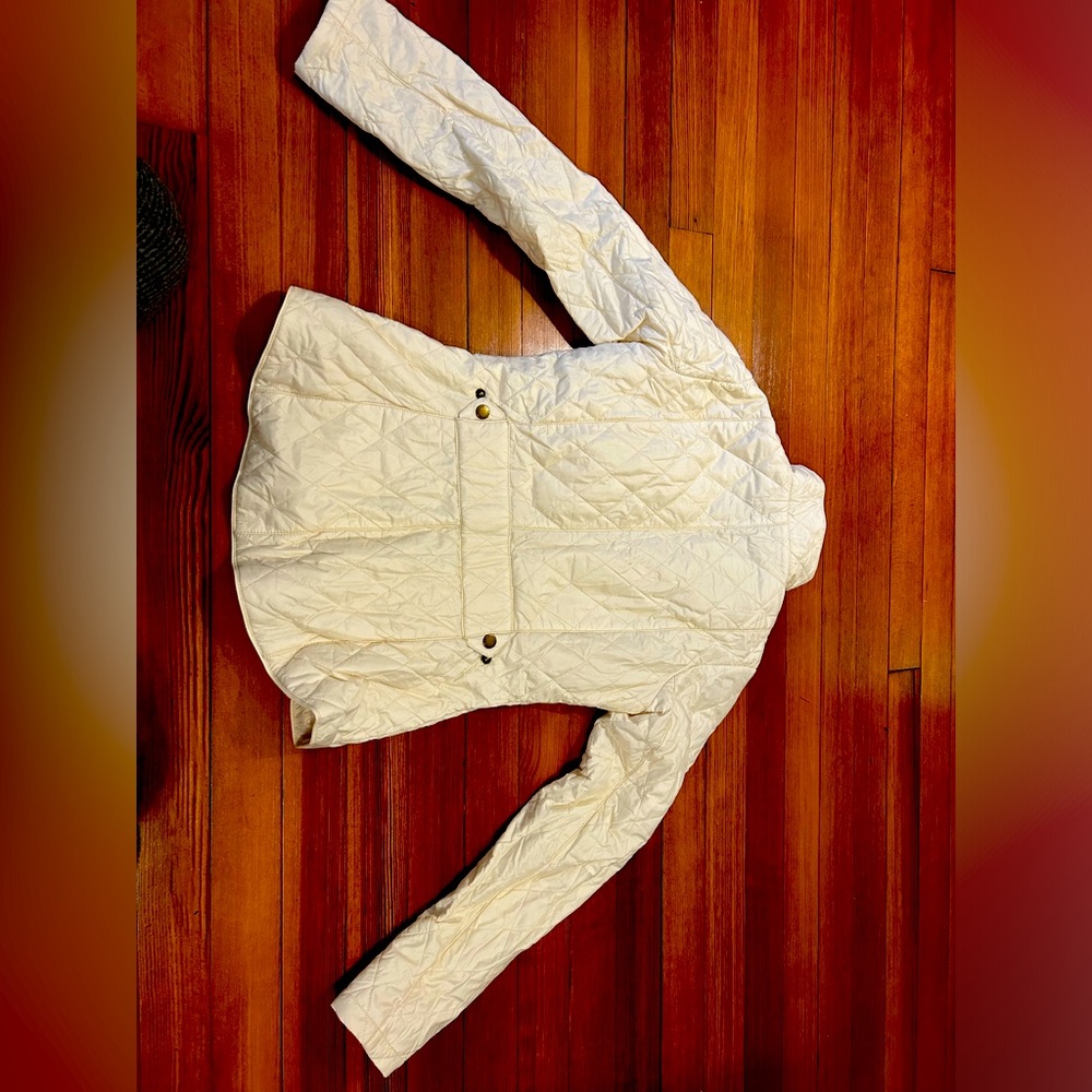 Pearl colored Barbour quilted jacket. Barely worn. Size 6 but brand runs small.